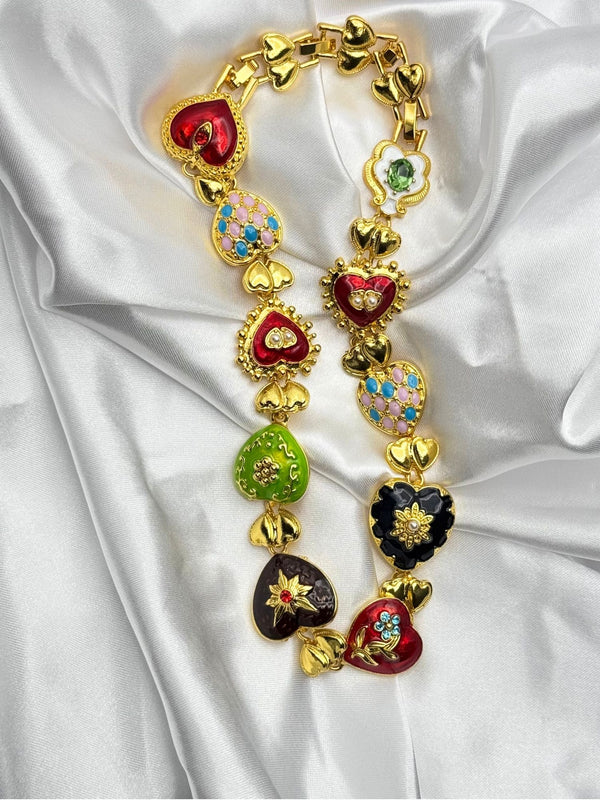 gold-tone heart charm necklacemulticolored heart necklaceenamel heart pendant necklacebold statement necklacewhimsical heart jewelry for womencolorful heart charm necklacetrendy gold-tone necklaceplayful fashion jewelryunique charm necklacewomen’s colorful statement necklace