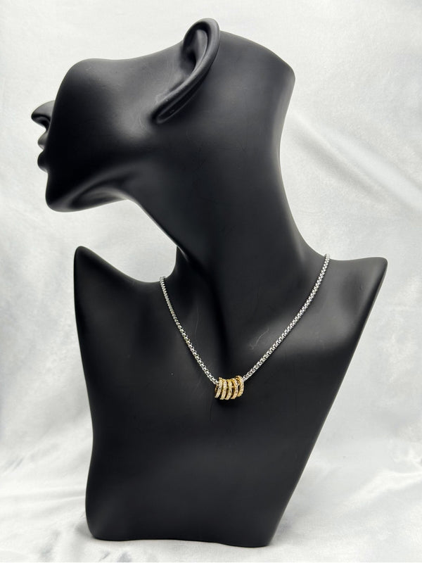 gold and silver-tone necklaceintertwined ring necklacecrystal embellished necklacemodern two-tone jewelrywomen’s fashion necklaceelegant gold and silver necklacesparkling crystal jewelryversatile statement necklacetrendy two-tone jewelry for womenluxury crystal accent necklaceunique jewelryfashionable jewelry