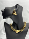 Geometric gold chain necklaceBold statement necklaceChunky gold chainTriangle pendant necklaceModern fashion jewelryEdgy gold necklaceStatement jewelry pieceUnique gold-tone necklace