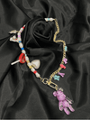 colorful happy charm necklaceplayful teddy bear necklacewhimsical letter charm necklacetrendy bead and pearl necklacefun charm necklace for womenbold statement charm jewelrycolorful bead necklace for womeneclectic charm necklacegold-tone teddy bear pendant necklacejoyful fashion necklaceunique jewelrystatement jewelrystatement necklacechic necklace