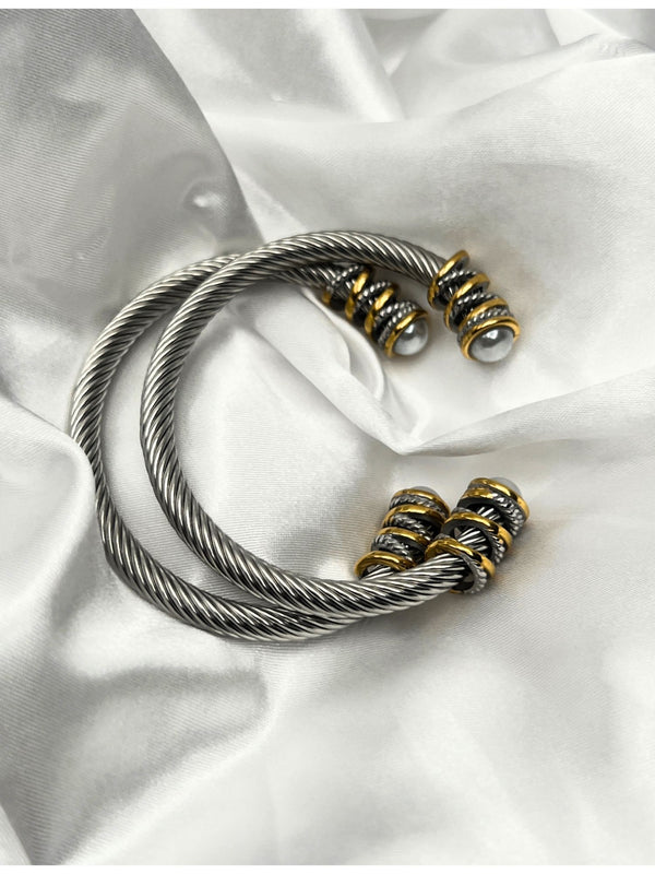 dual-tone bangle, silver and gold bangle, pearl accent bangle, stacked bangles, elegant twist bangle, luxury bangle set, elegant bracelet, classy bracelet