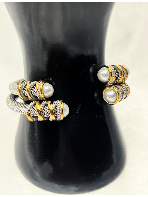 dual-tone bangle, silver and gold bangle, pearl accent bangle, stacked bangles, elegant twist bangle, luxury bangle set, elegant bracelet, classy bracelet