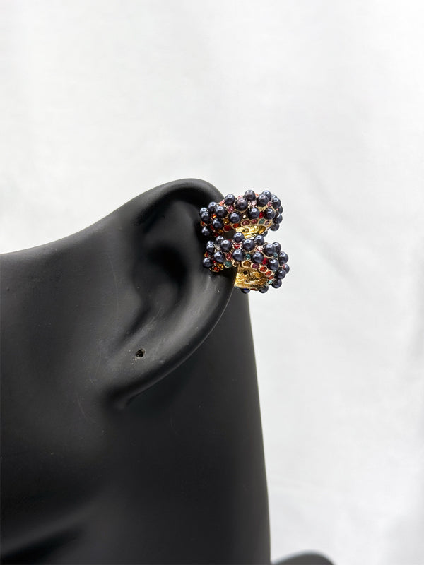 Radiant Cluster Ear CuffMulti-colored stone ear cuffBold statement ear cuffSparkling cluster ear cuffVibrant ear cuff jewelryColorful ear cuff earringsModern cuff earringsGlamorous statement ear accessory