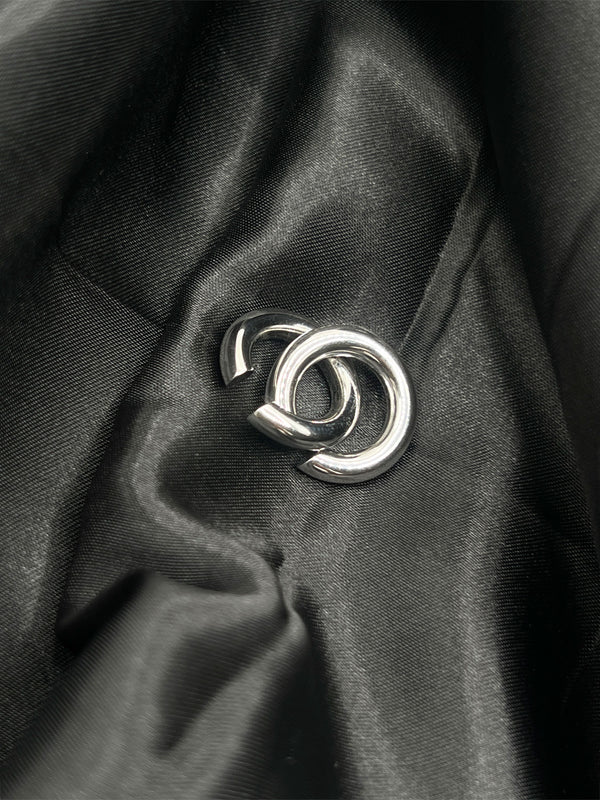 Cuff Me Double Hoop Silver EarringsModern silver hoop earringsDouble-loop cuff earringsBold silver statement earringsMinimalist silver earringsChic silver cuff hoopsContemporary silver jewelrySleek double hoop earrings