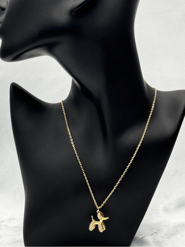 gold-tone balloon dog necklacewhimsical dog pendant jewelrycrystal balloon dog necklaceplayful animal necklace for womensparkling dog charm necklacetrendy statement necklacefun and quirky jewelrywomen’s gold animal necklaceunique dog pendant necklacegold-tone crystal necklace for womensimple necklaceclassy jewelry