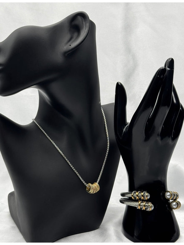 Silver and gold pendant necklacetrendy necklace trendy braceletTwisted cuff bracelet setPearl-accented braceletcuff braceletMixed metal jewelry setElegant jewelry for womenClassic and modern jewelry setStatement bracelet and necklace set