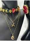 Multicolor heart charm chokerLayered pendant necklace setCrescent moon charm necklaceRed gemstone statement ringEnchanted jewelry set for womenPlayful and elegant jewelry collectionUnique charm jewelry setBoho chic layered necklace