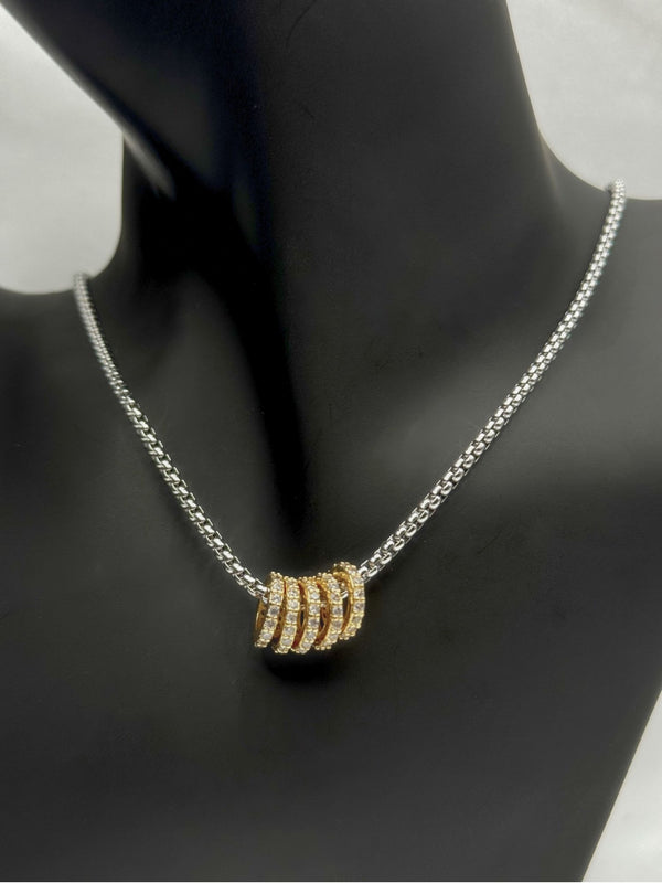 gold and silver-tone necklaceintertwined ring necklacecrystal embellished necklacemodern two-tone jewelrywomen’s fashion necklaceelegant gold and silver necklacesparkling crystal jewelryversatile statement necklacetrendy two-tone jewelry for womenluxury crystal accent necklaceunique jewelryfashionable jewelry