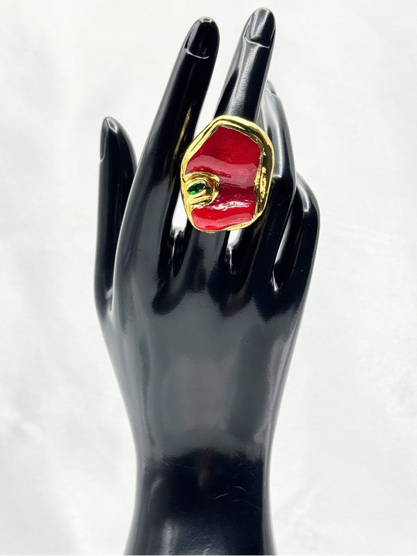 Bold and modern vibrant red stone encased in a textured gold setting.one size ringunique jewelryluxury fashion accessoryeye catching ringgemstone ring