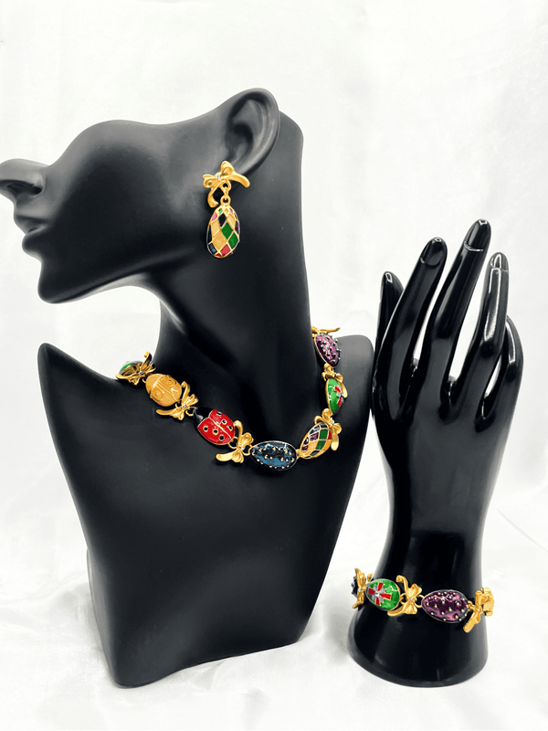 gold-tone egg charm bracelet setmulticolored egg jewelry setplayful statement bracelet and earringswhimsical gold-tone jewelrycolorful charm bracelet for womenbold fashion jewelry setunique egg charm accessorieselegant gold and enamel jewelrywomen’s multicolored bracelet settrendy statement jewelry set