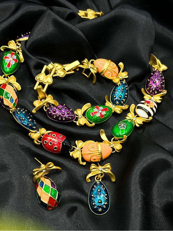 gold-tone egg charm bracelet setmulticolored egg jewelry setplayful statement bracelet and earringswhimsical gold-tone jewelrycolorful charm bracelet for womenbold fashion jewelry setunique egg charm accessorieselegant gold and enamel jewelrywomen’s multicolored bracelet settrendy statement jewelry set