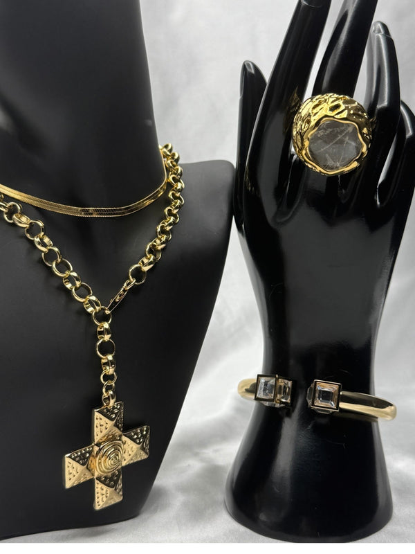 Gold statement jewelry setCross pendant necklaceBold crystal ringGold cuff bracelet with crystalsElegant and edgy jewelry setGilded Grace jewelry setModern luxury jewelry setClassic and contemporary jewelry