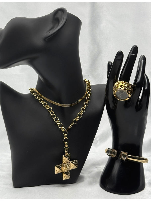 Gold statement jewelry setCross pendant necklaceBold crystal ringGold cuff bracelet with crystalsElegant and edgy jewelry setGilded Grace jewelry setModern luxury jewelry setClassic and contemporary jewelry