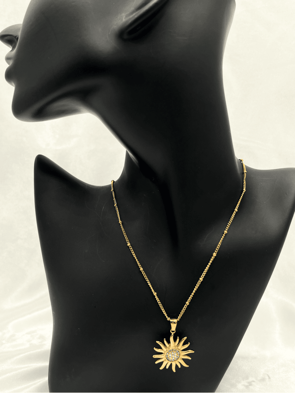 gold-tone sun pendant necklacecrystal sun necklaceradiant sun jewelry for womengold-tone statement necklacewomen’s celestial sun necklacetrendy gold sun pendantsparkling sun necklace for womenbold sun charm necklaceelegant crystal pendant necklaceunique sun jewelry for womenunique jewelry