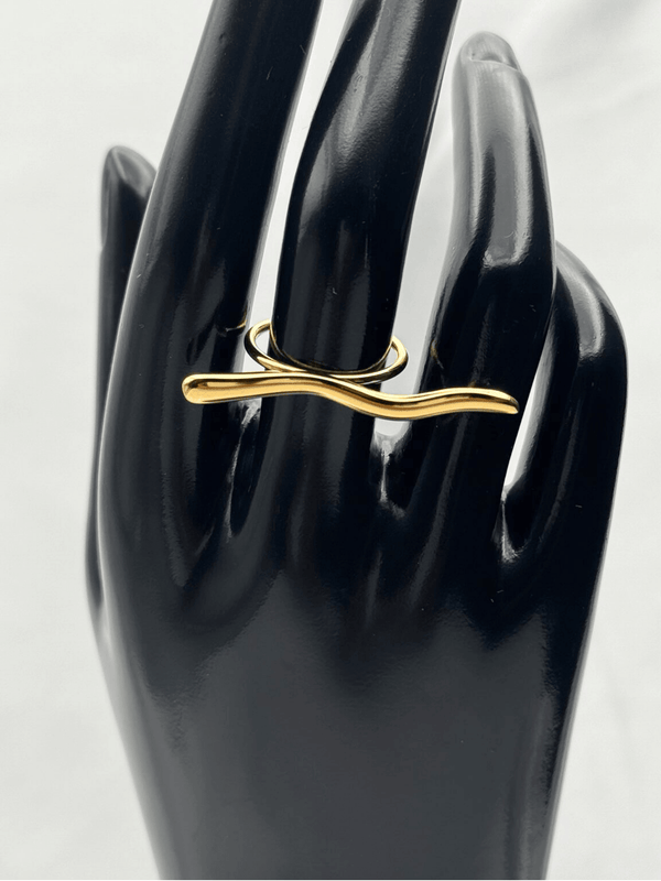 Minimalist gold wave ringTrendy jewelryModern gold-plated ringWavy design statement ringAdjustable sleek gold ringContemporary ring for womenMinimalist stacking ringElegant gold ripple ringFashion-forward gold accessorystatement ring
