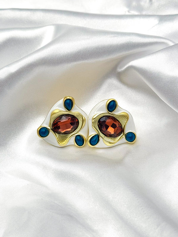 Unique gemstone stud earringsStatement stud earringsCelestial inspired earringsMystical gemstone earringsBold stud earrings for womenFashion jewelry statement earringsElegant celestial earringsEmpress Emerald EarringsGreen stone vintage earringsRoyal-inspired statement jewelryGold and gemstone earringsPearl-accented regal earringsClassic vintage jewelry pieceLuxurious emerald earringsOrnate gold and green earrings