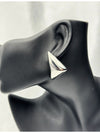 Silverstatement earringsPyramid silver earringsBold geometric earringsModern silver earringsEmpowering jewelry for womenFashion earrings silverUnique silver-tone earringsStylish angular earrings