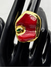 Bold and modern vibrant red stone encased in a textured gold setting.one size ringunique jewelryluxury fashion accessoryeye catching ringgemstone ring