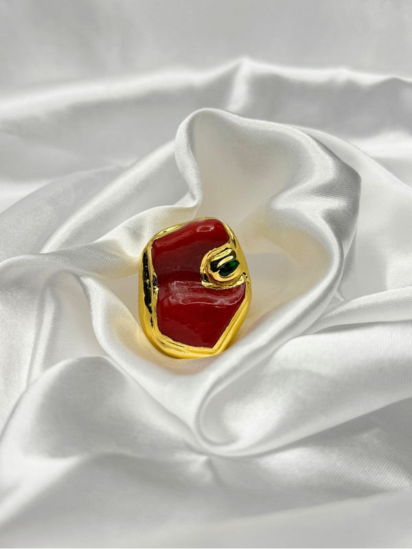 Bold and modern vibrant red stone encased in a textured gold setting.one size ringunique jewelryluxury fashion accessoryeye catching ringgemstone ring