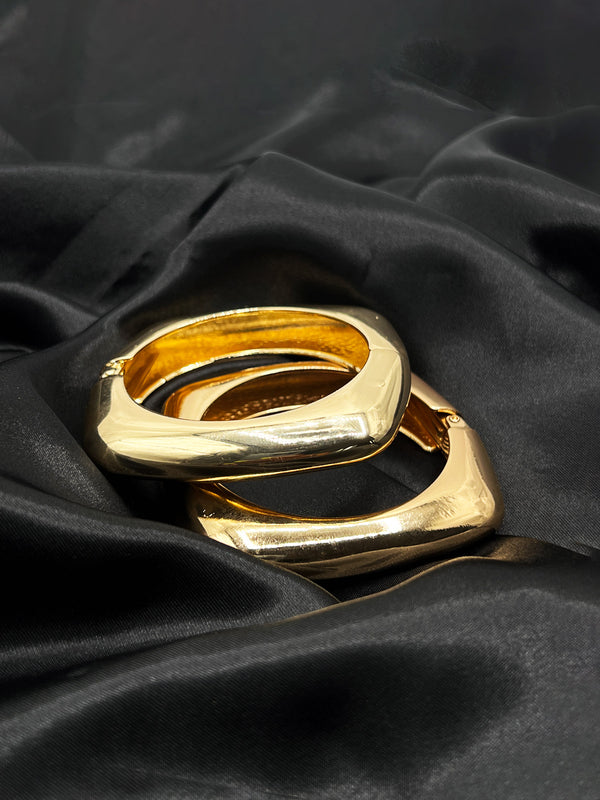 gold bangle bracelet, Infinite Love bangle, structured gold jewelry, glossy gold bracelet, unique shape gold bangle, statement gold bracelet, luxury gold jewelry