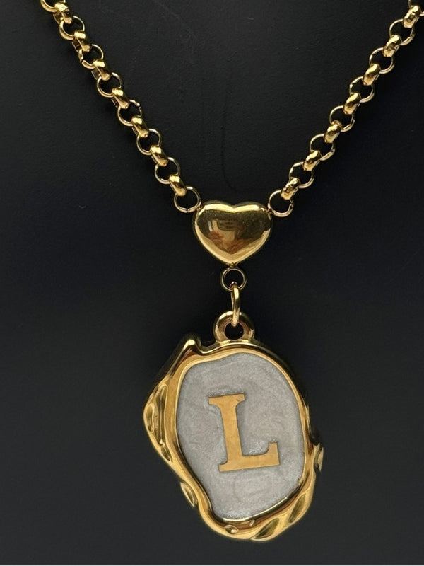 gold-tone initial pendant necklacepersonalized letter necklacewhite enamel initial necklacestylish "L" initial necklaceelegant monogram jewelrywomen’s fashion initial pendanttrendy gold letter necklacepersonalized jewelry for womencustom initial necklacetimeless gold-tone necklace with enamel detailingunique jewelry
