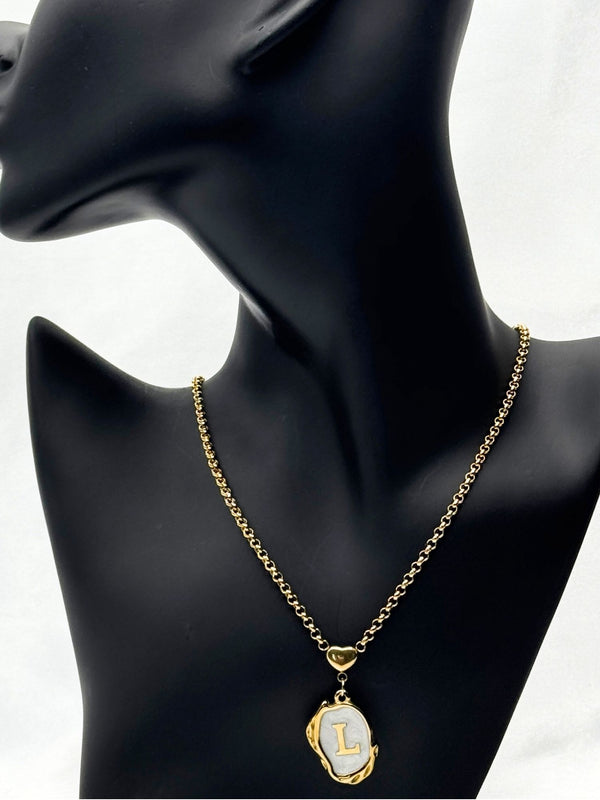 gold-tone initial pendant necklacepersonalized letter necklacewhite enamel initial necklacestylish "L" initial necklaceelegant monogram jewelrywomen’s fashion initial pendanttrendy gold letter necklacepersonalized jewelry for womencustom initial necklacetimeless gold-tone necklace with enamel detailingunique jewelry
