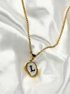 gold-tone initial pendant necklacepersonalized letter necklacewhite enamel initial necklacestylish "L" initial necklaceelegant monogram jewelrywomen’s fashion initial pendanttrendy gold letter necklacepersonalized jewelry for womencustom initial necklacetimeless gold-tone necklace with enamel detailingunique jewelry