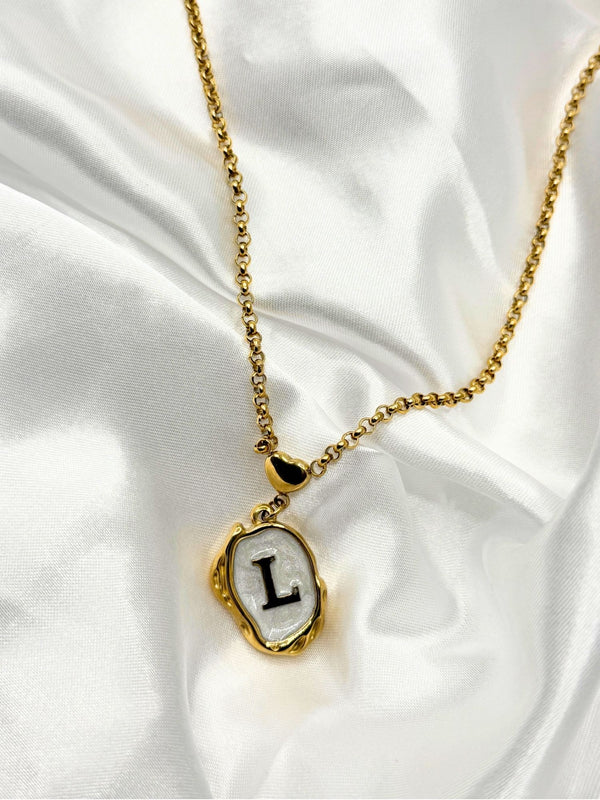 gold-tone initial pendant necklacepersonalized letter necklacewhite enamel initial necklacestylish "L" initial necklaceelegant monogram jewelrywomen’s fashion initial pendanttrendy gold letter necklacepersonalized jewelry for womencustom initial necklacetimeless gold-tone necklace with enamel detailingunique jewelry