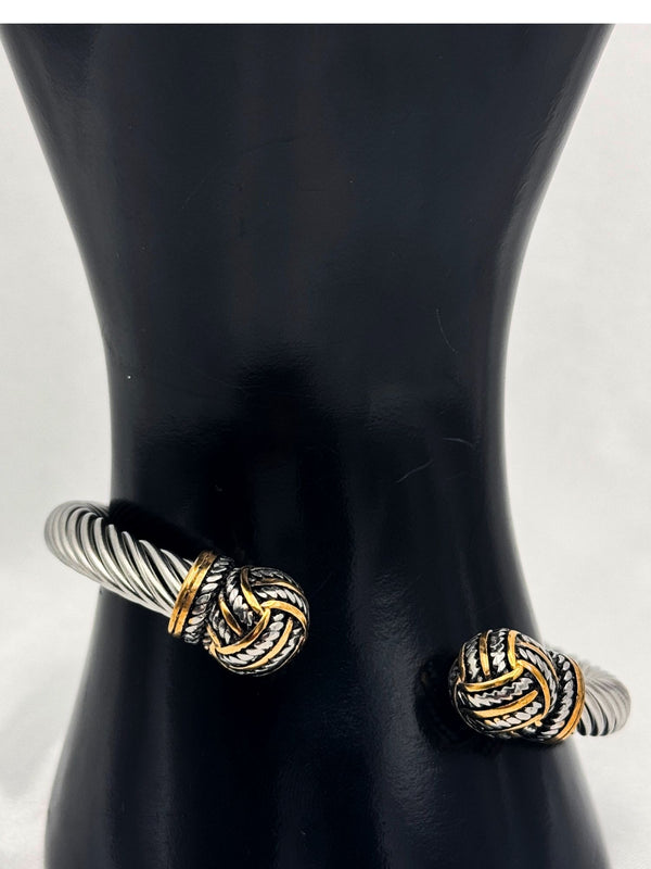 dual-tone bracelet, silver and gold cuff, Iron Grace bracelet, twisted cable bracelet, knot-end bracelet, statement cuff bracelet, elegant two-tone bracelet