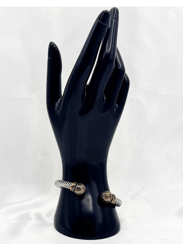 dual-tone bracelet, silver and gold cuff, Iron Grace bracelet, twisted cable bracelet, knot-end bracelet, statement cuff bracelet, elegant two-tone bracelet