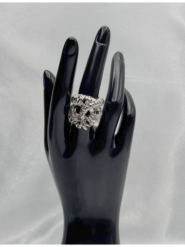 textured silver twist ring. Its intricate design features a twisted, rope-like structure with detailed texture, giving it a unique and eye-catching look. This ring is perfect for those who love chunky, statement jewelry and want to add a touch of luxury to their collection. Ideal for elevating any outfit, whether casual or formal.Silvertwist ringTextured silverringChunky statement ringUnique fashion jewelryBoldsilver ringLuxury fashion accessoriesTwisted silver ring designStatement ring