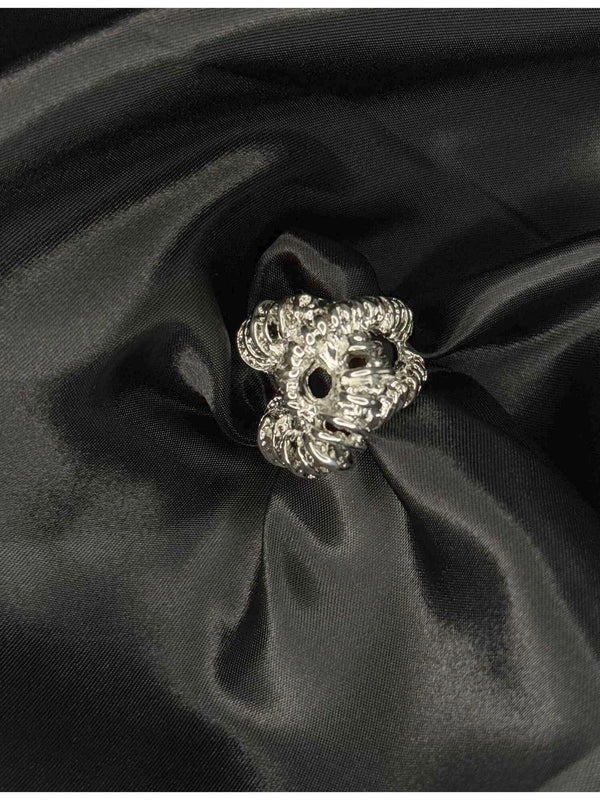 textured silver twist ring. Its intricate design features a twisted, rope-like structure with detailed texture, giving it a unique and eye-catching look. This ring is perfect for those who love chunky, statement jewelry and want to add a touch of luxury to their collection. Ideal for elevating any outfit, whether casual or formal.Silvertwist ringTextured silverringChunky statement ringUnique fashion jewelryBoldsilver ringLuxury fashion accessoriesTwisted silver ring designStatement ring