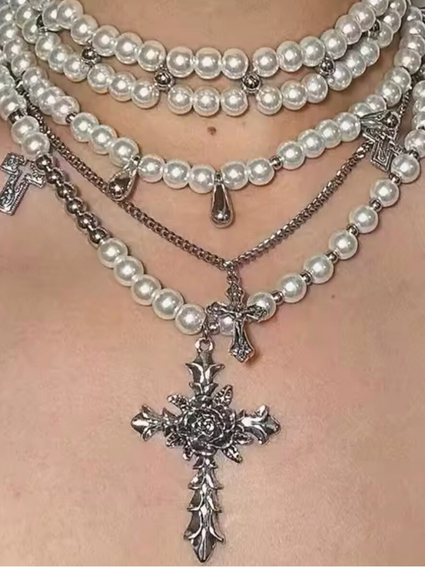 Layered pearl necklaceVersatile detachable necklaceSilver cross pendant necklaceElegant three-in-one jewelryMulti-chain statement necklacePearl choker with cross pendantVintage-inspired layered necklaceSophisticated women's jewelryAdjustable pearl necklace setTimeless layered jewelry piece
