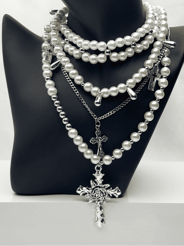 Layered pearl necklaceVersatile detachable necklaceSilver cross pendant necklaceElegant three-in-one jewelryMulti-chain statement necklacePearl choker with cross pendantVintage-inspired layered necklaceSophisticated women's jewelryAdjustable pearl necklace setTimeless layered jewelry piece
