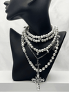Layered pearl necklaceVersatile detachable necklaceSilver cross pendant necklaceElegant three-in-one jewelryMulti-chain statement necklacePearl choker with cross pendantVintage-inspired layered necklaceSophisticated women's jewelryAdjustable pearl necklace setTimeless layered jewelry piece