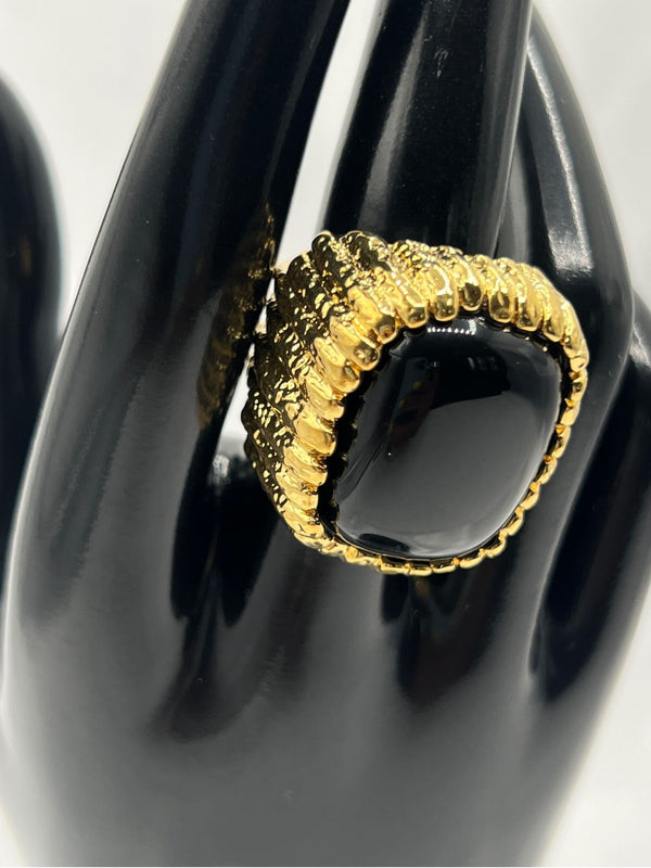 black and gold statement ring featuring a bold, square-shaped black stone framed in a textured gold band, glossy black stone and the intricate gold detailing standout pieceunique, high-impact jewelry.Black and gold statement ringBold black stone ringSquare black stone ringTextured gold ringChunky gold ring