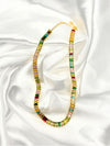 gold-tone multicolored gemstone necklacecolorful baguette-cut stone necklacevibrant gemstone statement necklaceluxury multicolored necklace for womenbold fashion necklacecolorful jewelry for special occasionswomen’s multicolor stone necklacetrendy gemstone jewelryelegant statement necklace for womenluxury gold-tone necklace with gemstones