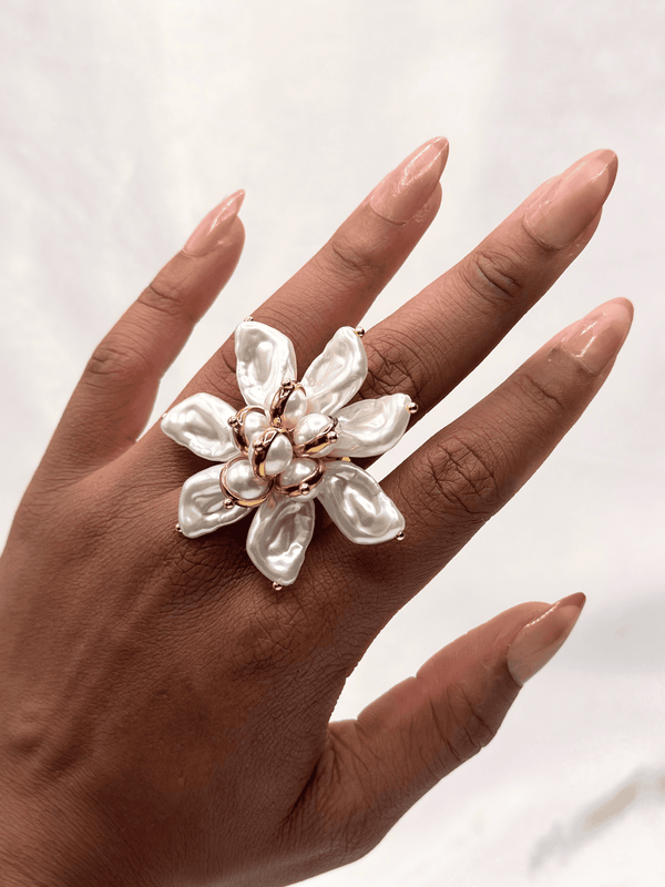 Pearl flower ringStatement floral jewelryGold-tone pearl ringBaroque-inspired statement ringBlooming flower ring designElegant pearl statement pieceWomen’s bold jewelryUnique floral cocktail ringLuxury gold and pearl ringArtistic flower-inspired ringLarge statement pearl ringTrendy pearl jewelryWedding guest accessoriesDesigner floral ringHandcrafted pearl jewelry