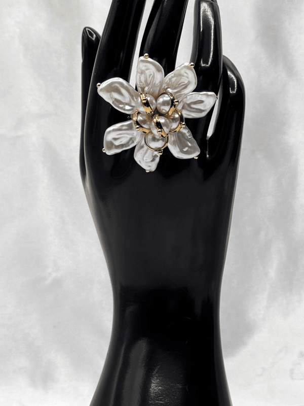 Pearl flower ringStatement floral jewelryGold-tone pearl ringBaroque-inspired statement ringBlooming flower ring designElegant pearl statement pieceWomen’s bold jewelryUnique floral cocktail ringLuxury gold and pearl ringArtistic flower-inspired ringLarge statement pearl ringTrendy pearl jewelryWedding guest accessoriesDesigner floral ringHandcrafted pearl jewelry