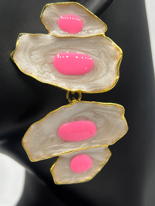 shell earrings, bold pink accent earrings, statement shell jewelry, open shell design earrings, gold-edged earrings, unique artistic earrings