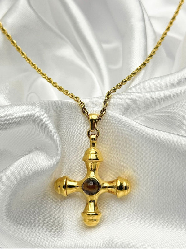 gold-tone cross pendant necklaceelegant cross necklace for men and womenbold cross jewelrychic jewelryclassic necklacetwisted chain cross necklacereligious pendant necklacemeaningful gold-tone jewelrystatement cross necklacespiritual fashion accessoriesclassic gold cross necklaceluxury religious jewelryunique jewelry
