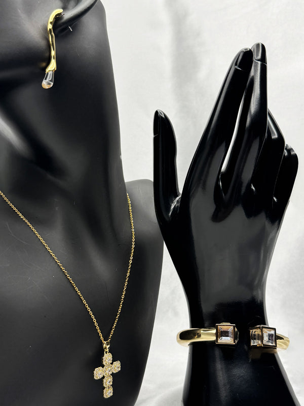 Gold cross pendant necklaceCrystal cuff braceletModern drop earringsElegant jewelry set for womenStatement jewelry collectionEthereal Elegance jewelry setLuxurious gold jewelry ensembleContemporary classic jewelry