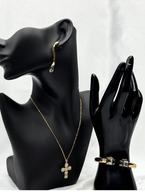 Gold cross pendant necklaceCrystal cuff braceletModern drop earringsElegant jewelry set for womenStatement jewelry collectionEthereal Elegance jewelry setLuxurious gold jewelry ensembleContemporary classic jewelry
