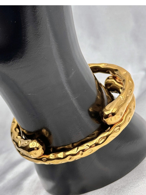 ripple bangle bracelet, silver tone wavy bracelet, minimalist ripple jewelry, unique textured bangle, modern silver bracelet, statement wrist accessory, sleek ripple design