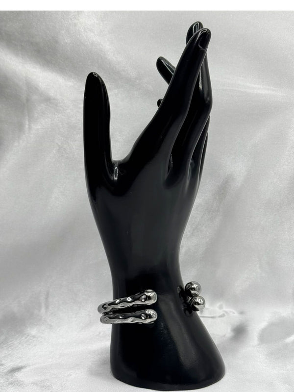 ripple bangle bracelet, silver tone wavy bracelet, minimalist ripple jewelry, unique textured bangle, modern silver bracelet, statement wrist accessory, sleek ripple design