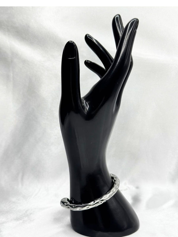 ripple bangle bracelet, silver tone wavy bracelet, minimalist ripple jewelry, unique textured bangle, modern silver bracelet, statement wrist accessory, sleek ripple design