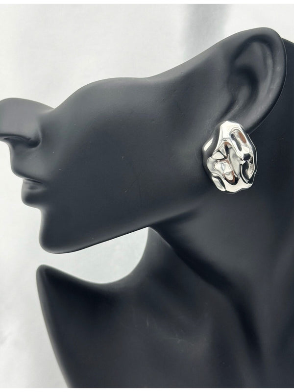 Sculptural silver earringsOrganic shape earringsBold silver statement earringsArtistic silver jewelryUnique silver earrings for womenAvant-garde silver earringsStatement earrings for individualityFluid design silver jewelry