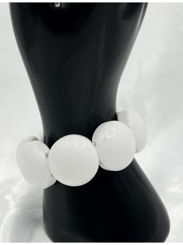 white bangle bracelet, chunky white bracelet, minimalist white bangle, modern statement jewelry, polished white accessory