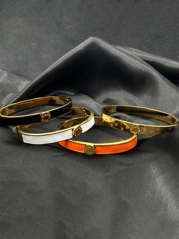 colorful bangle set, Roman numeral bangles, gold stackable bracelets, chic fashion bangles, trendy color-block jewelry, versatile stylish bangles, women’s luxury wristwear
