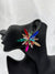 colorful starburst earrings, prism crystal earrings, multi-colored statement earrings, bold fashion jewelry, vibrant star earrings, artistic colorful earrings